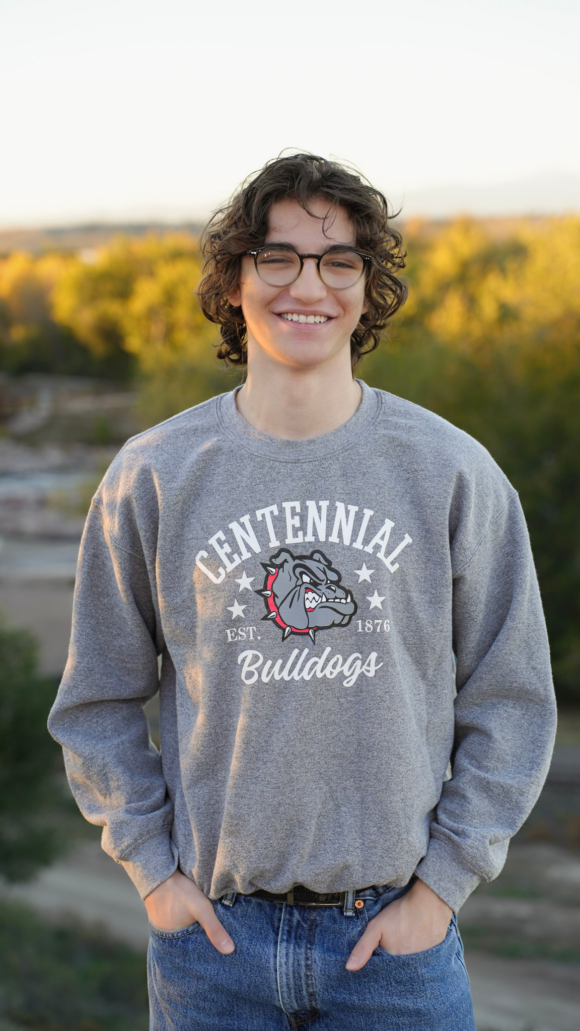 Senior portrait in Centennial Bulldogs sweatshirt
