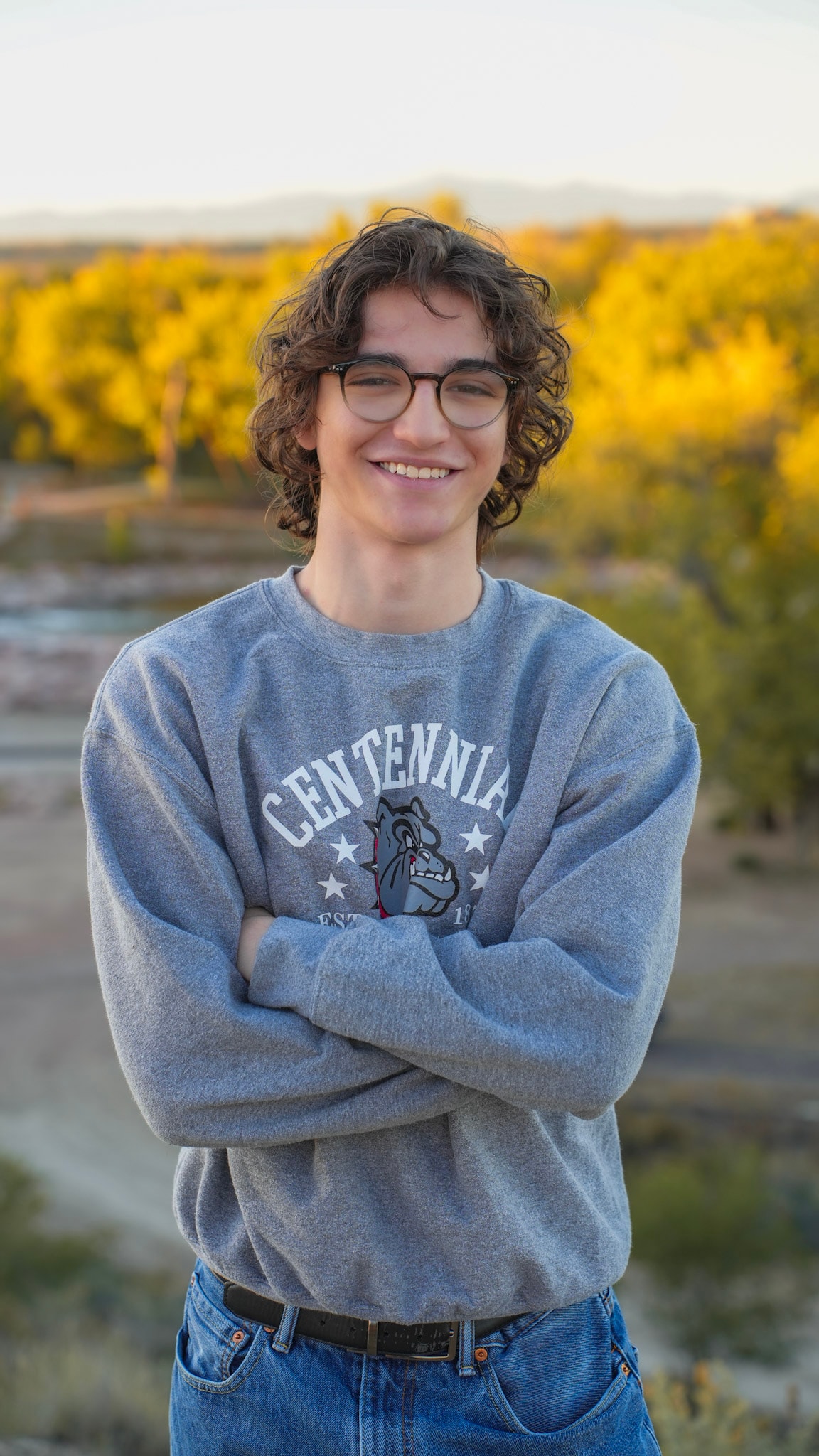 Senior portrait in sunflower field