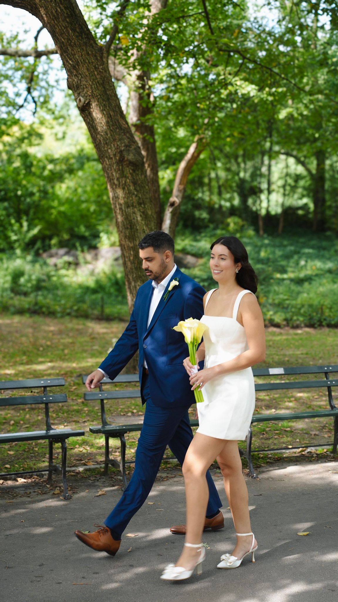 BeniCelo wedding - couple walking along Central Park path